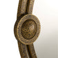 Bronze decorative item with intricate patterns on a white background