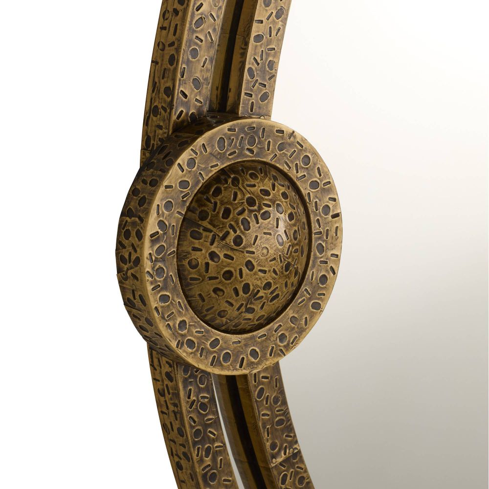 Bronze decorative item with intricate patterns on a white background