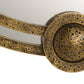 Decorative bronze mirror with intricate patterns on a white background