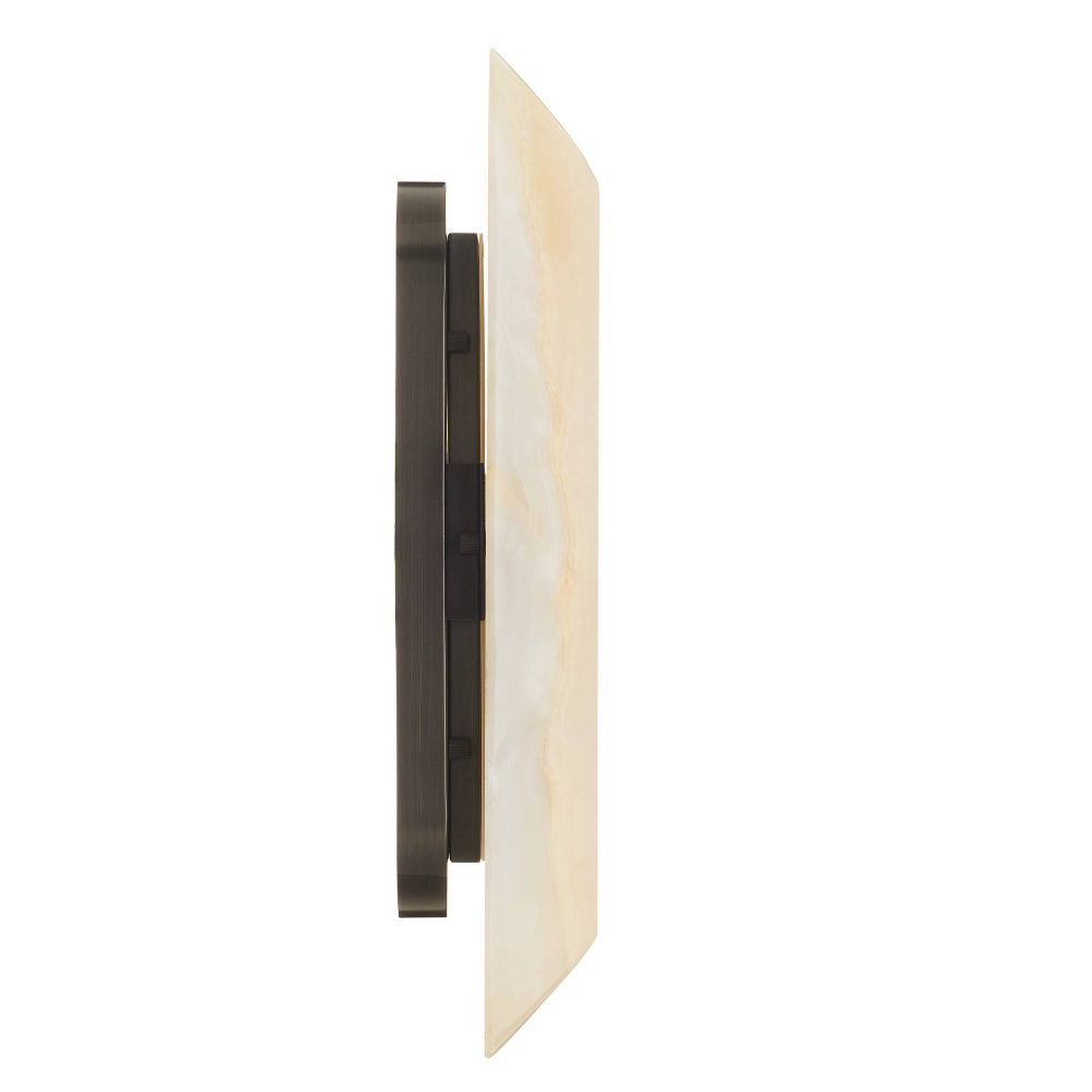 Modern wall sconce with a black finish and beige glass on a white background