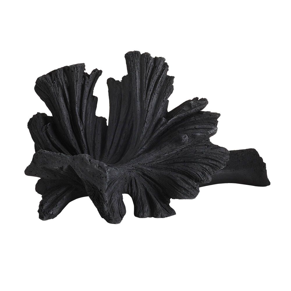 Black decorative leaf-like object on a white background
