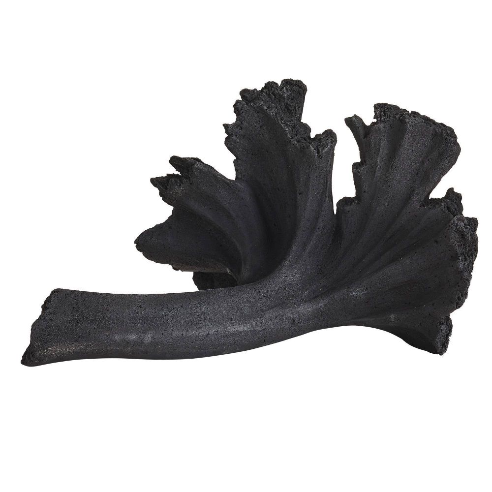 Black decorative coral-like object on a white background