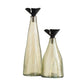 Two glass bottles with black lids on a white background