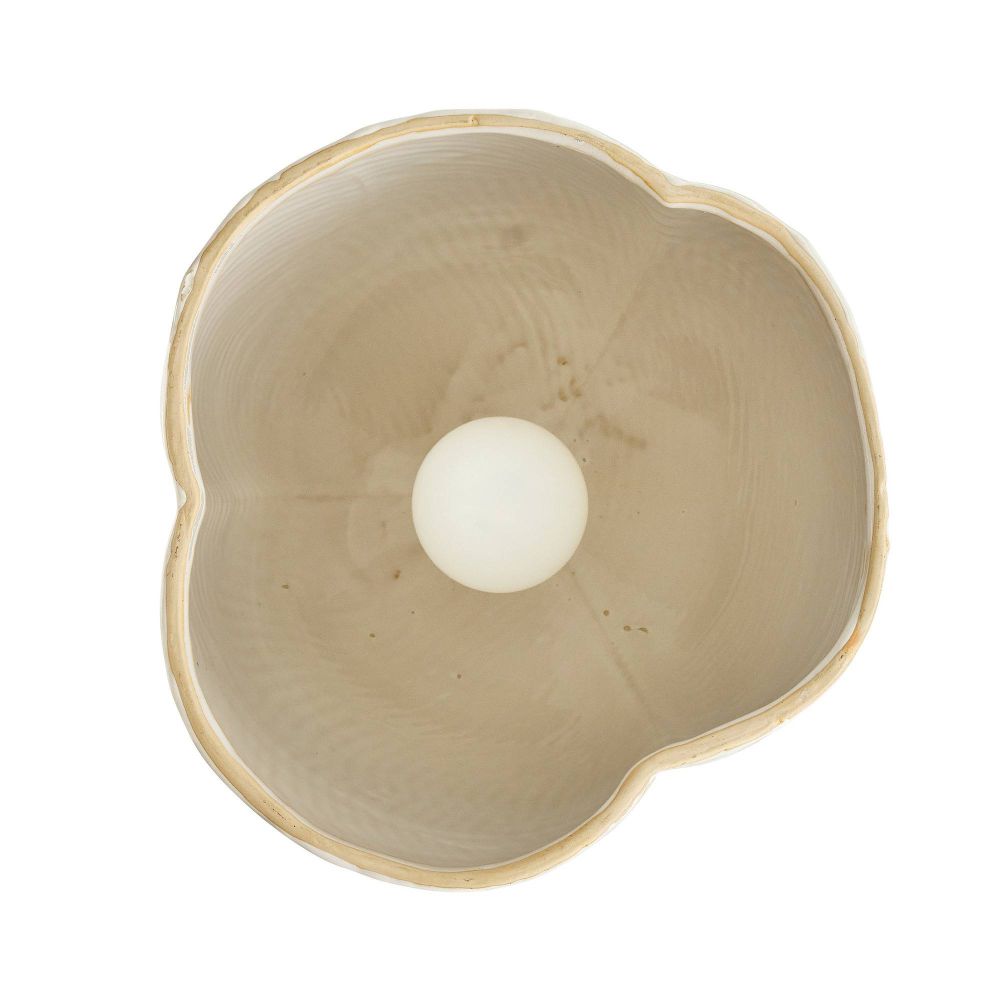 Beige ceramic bowl with a white ball inside on a white background