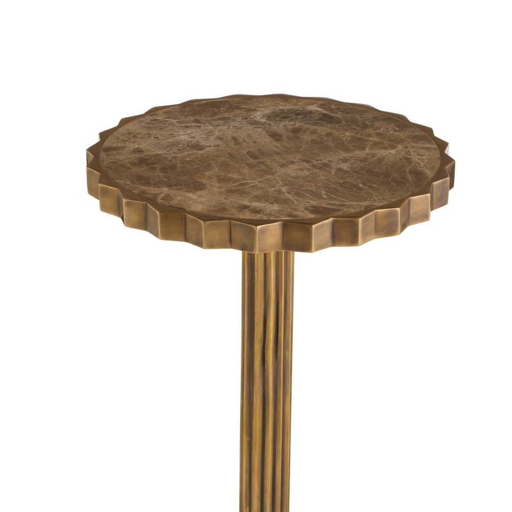 Round marble table with a textured surface on a white background