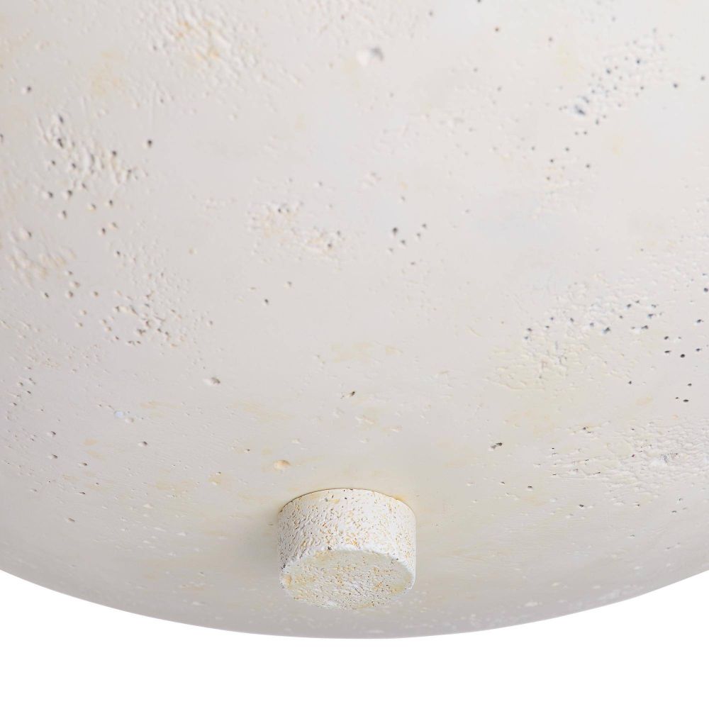 Close-up of a textured white ceiling light fixture