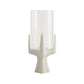 White candle holder with a cylindrical glass candle on a white background