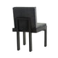 Black dining chair with cushioned seat and backrest on a white background