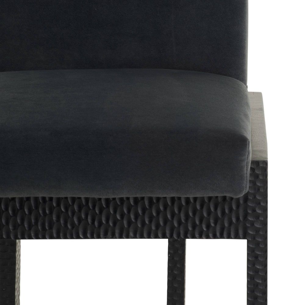 Black dining chair with cushioned seat and backrest on a white background