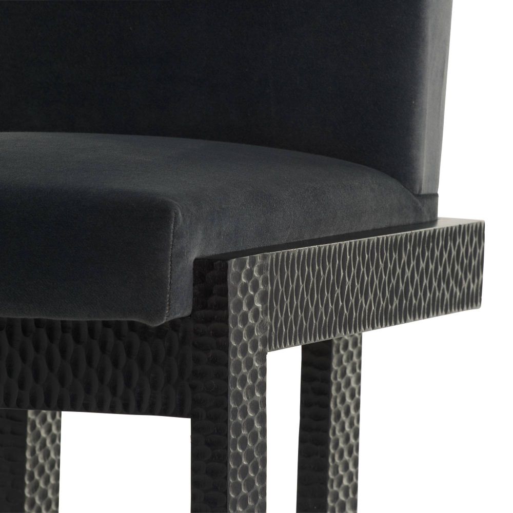 Black dining chair with cushioned seat and backrest on a white background