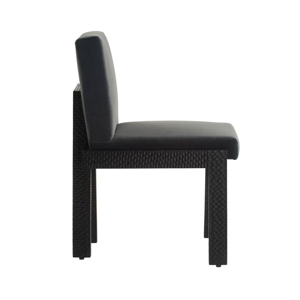 Black dining chair with cushioned seat and backrest on a white background