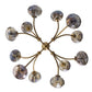 Decorative chandelier with glass globe lights on a white background