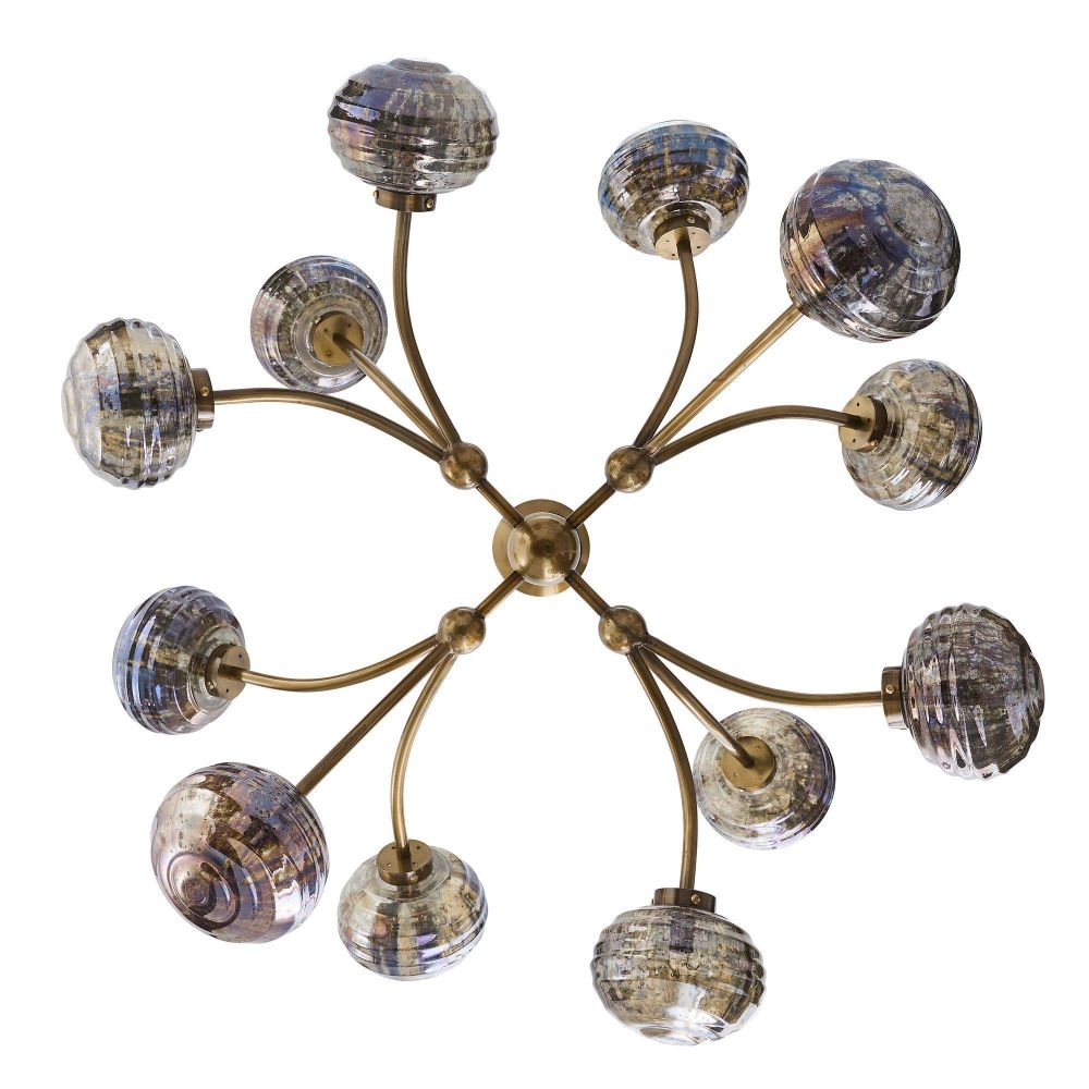 Decorative chandelier with glass globe lights on a white background
