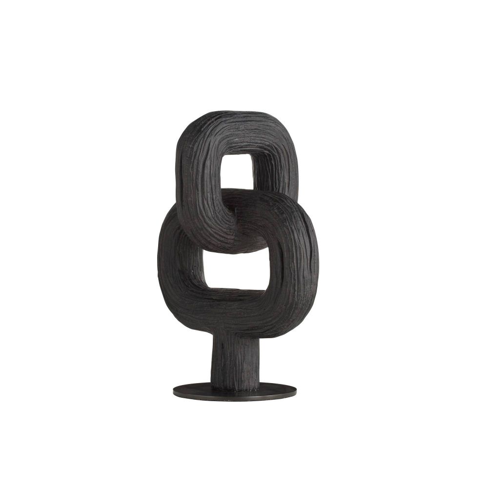 Black abstract sculpture on a white background