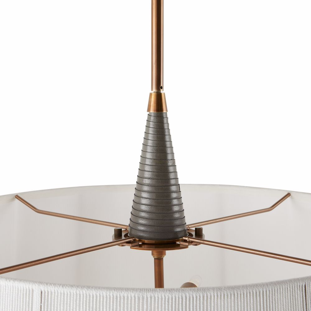 Close-up of a modern ceiling light fixture with a gray and gold design on a white background