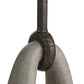 Close-up of a metal hook with a textured surface on a white background