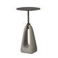 Small round table with a concrete base on a white background
