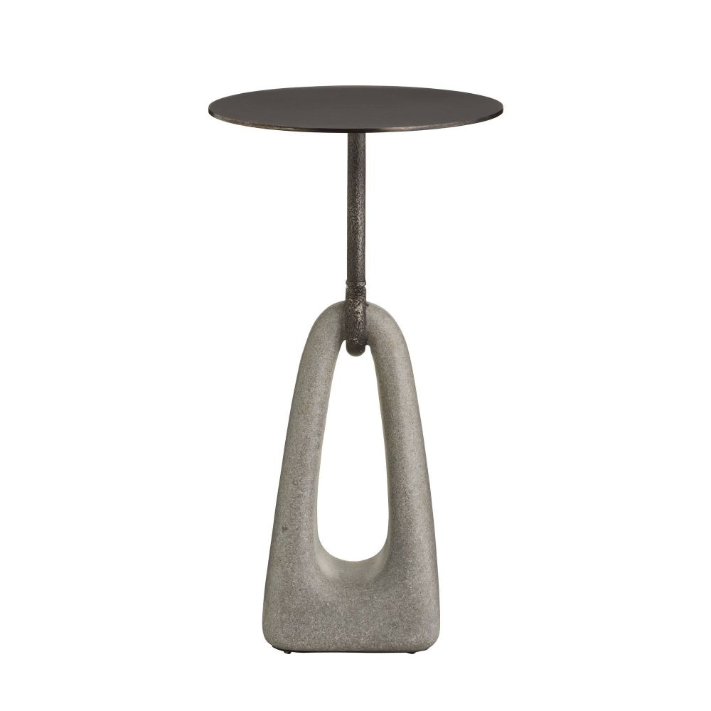 Small round table with a unique base design on a white background