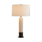Table lamp with a beige shade and cylindrical base on a white background