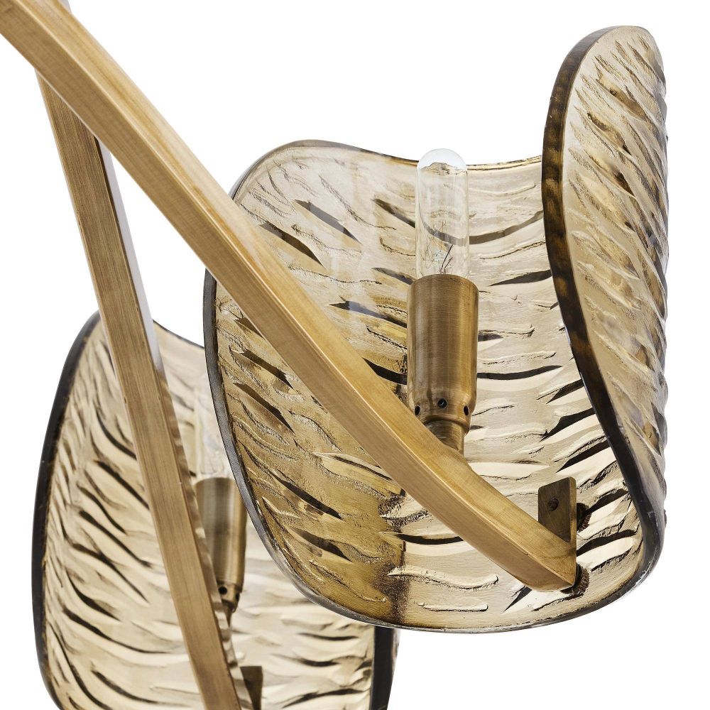 Decorative wall light fixture with wicker-like design and wooden arm on a white background