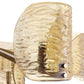 Close-up of a gold ring with textured design on a white background