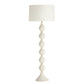 White textured floor lamp with a white shade on a white background