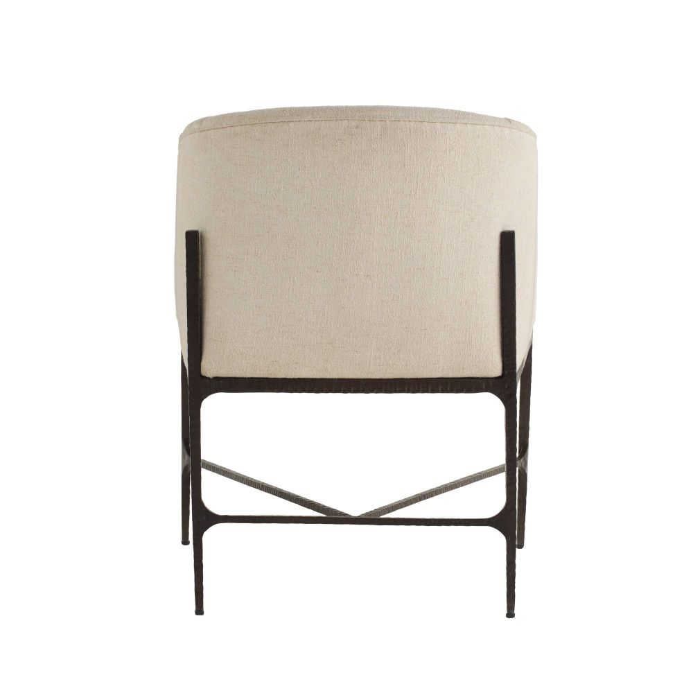 Beige chair with black metal frame on a white background