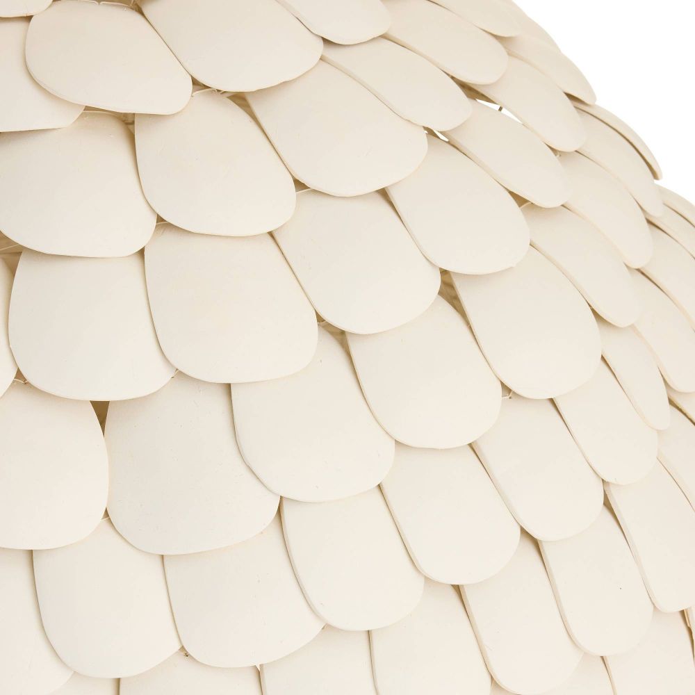 Close-up of a textured beige surface with circular patterns