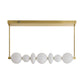 Ceiling light fixture with gold frame and white circular shades on a white background