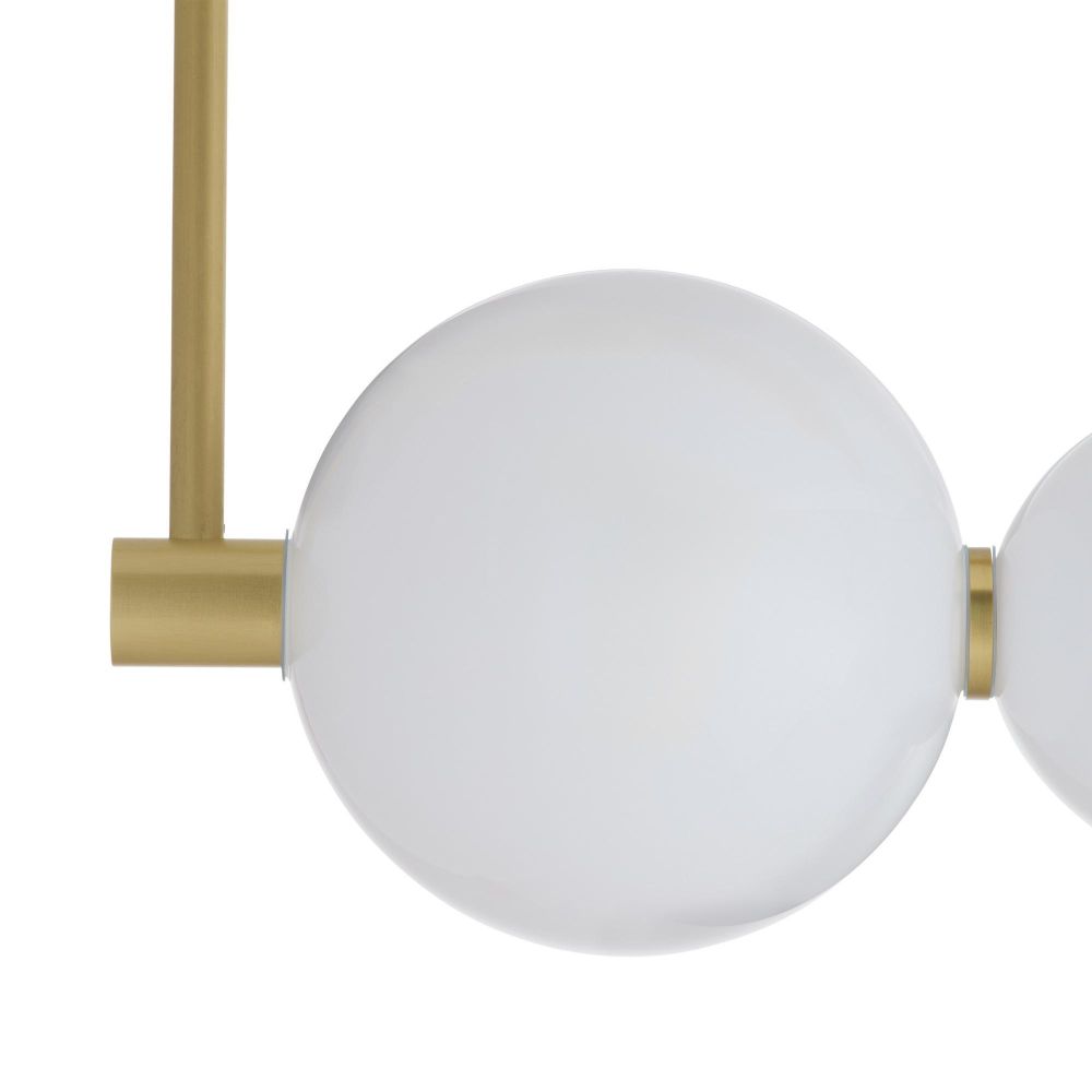 Close-up of a modern pendant light with white glass spheres and gold fixtures on a white background.