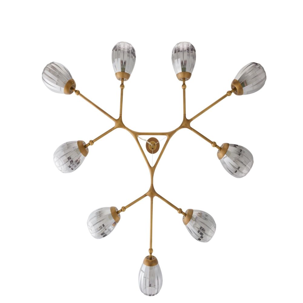 Modern chandelier with gold and clear glass shades on a white background