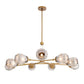 Modern chandelier with gold frame and glass shades on a white background
