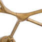 Gold metal chair base on a white background