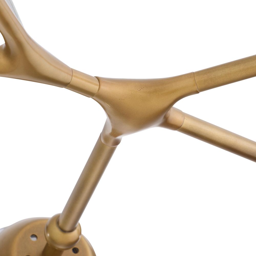 Gold metal chair base on a white background