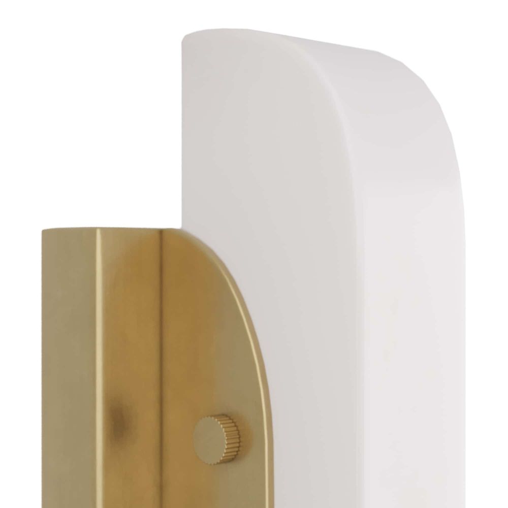 Close-up of a gold door handle with a white cylindrical component on a white background