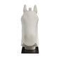 White horse head sculpture on a black base against a white background