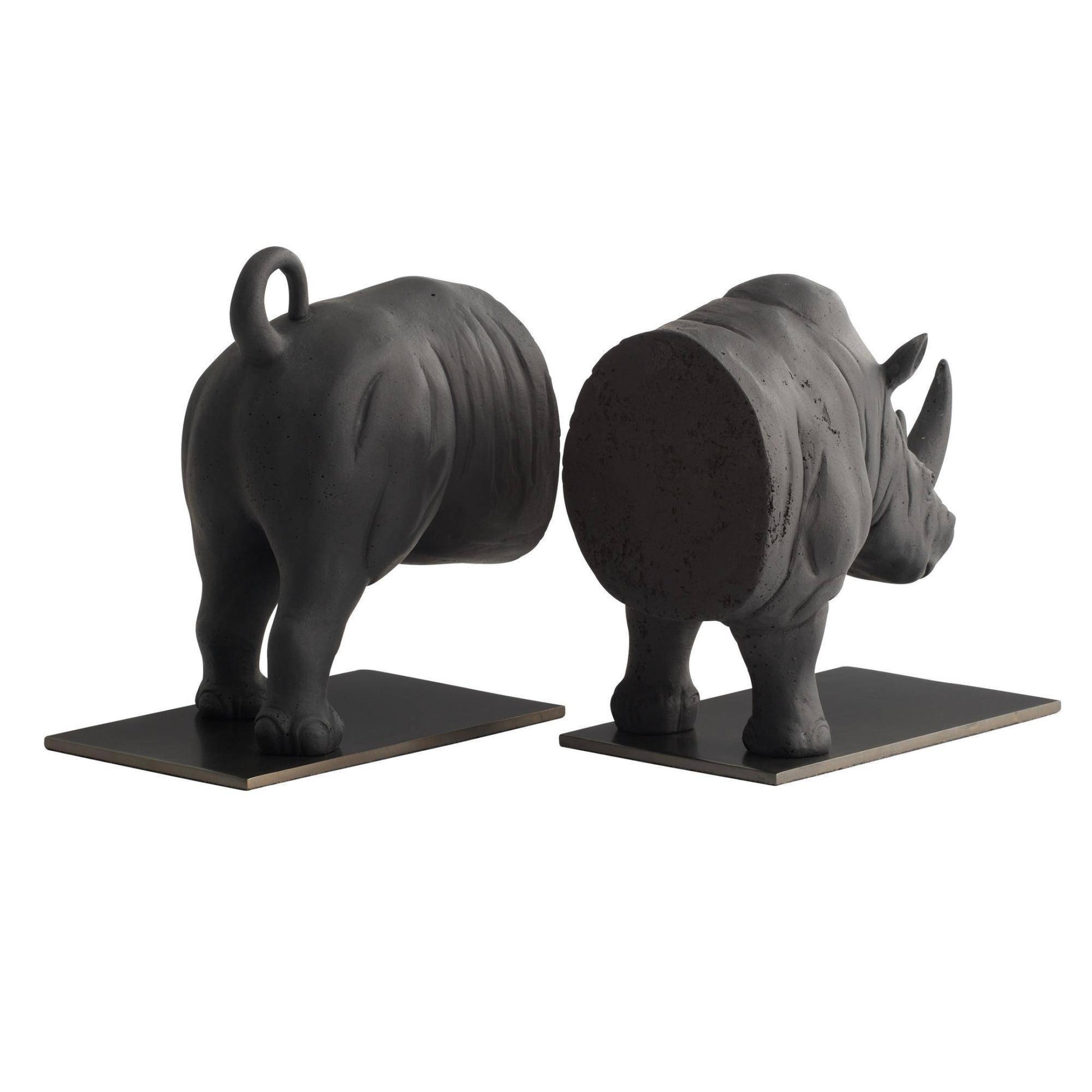 Two black rhinoceros bookends on a white background