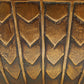 Close-up of textured brown pattern resembling a tire tread
