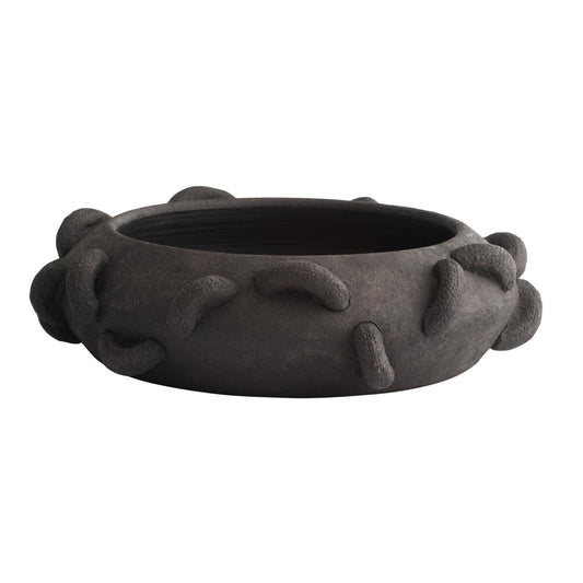 Black textured bowl on a white background