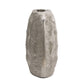 Textured aluminum vase on a white background