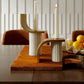 brown hair on hide tray with antique brass handles
