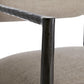 Close-up of a textured metal chair leg with a beige cushioned seat and backrest.