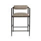 Bar stool with brown cushioned seat and backrest on a white background
