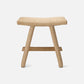 Wooden stool with woven seat on a white background