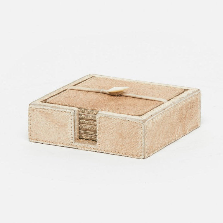A small square beige hair on hide coaster set