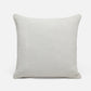 Quilted gray pillow on a white background