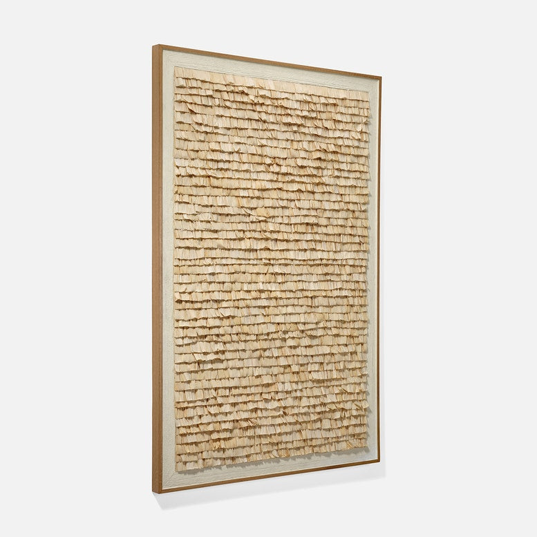 Framed textured wall art on a white background