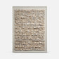 Framed textured wall art on a white background