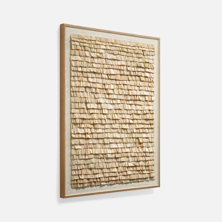 Framed textured artwork on a white background