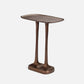 Bronze side table on a white background